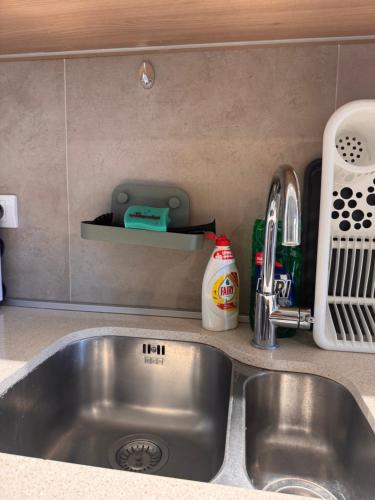 a kitchen counter with a sink and a sink at BW Verde Icon in Belgrade