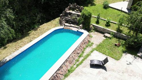 an overhead view of a swimming pool in a yard at Casa Paradise in Dilijan