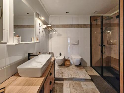 Koupelna v ubytování Apartmaji Remsova