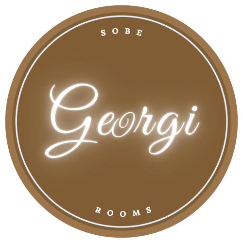 a brown circle with the word sorority written on it at Georgi 1 in Subotica