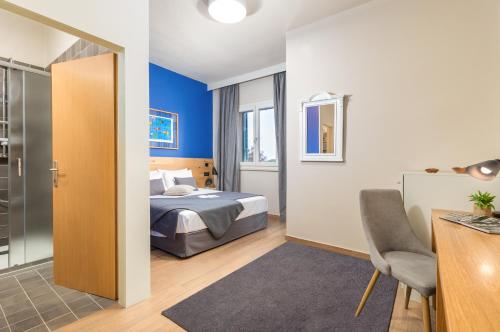 Ένα ή περισσότερα κρεβάτια σε δωμάτιο στο Rooms Alla Beccaccia