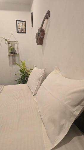 Postel nebo postele na pokoji v ubytování Cascara Beach Resort