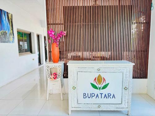 a sign in the middle of a room at Dancenter Bupatara Chiangmai in Chiang Mai