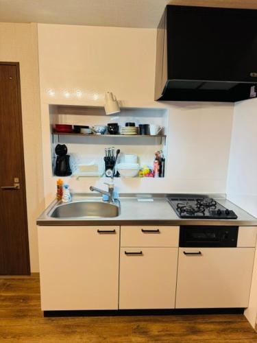Una cocina o cocineta en Boogie Garden