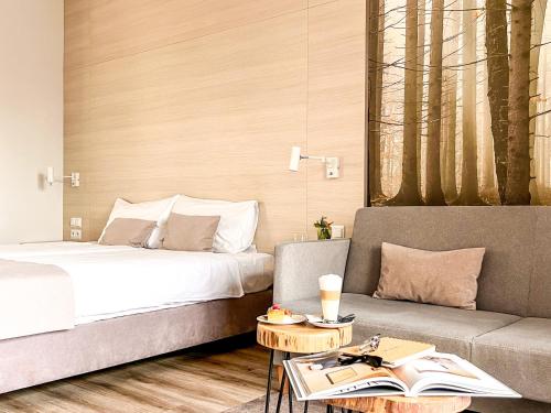 Ένα ή περισσότερα κρεβάτια σε δωμάτιο στο Notera Hotel SPA