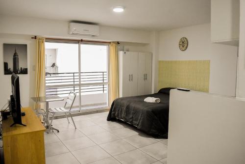 Katil atau katil-katil dalam bilik di Centro - Moderno - Con Balcon!