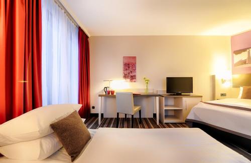 Et tv og/eller underholdning på Leonardo Hotel Hannover Airport