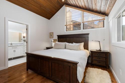 a bedroom with a large bed and a window at Ledges 78 with Wintergreen Advantage in Wintergreen