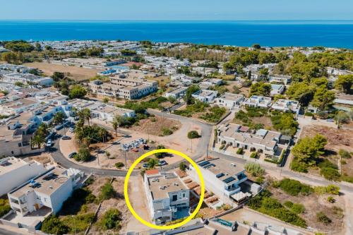 an aerial view of a house with a yellow circle around it at Il Rosmarino Casa Vacanze in Taviano