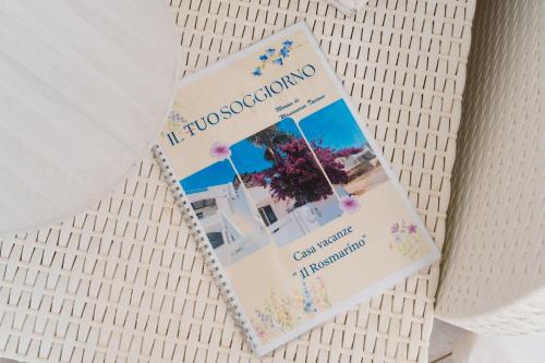 a book sitting on top of a table at Il Rosmarino Casa Vacanze in Taviano