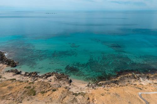 an aerial view of the ocean near a beach at Il Rosmarino Casa Vacanze in Taviano