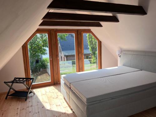 Ένα ή περισσότερα κρεβάτια σε δωμάτιο στο Seeblick Cottage