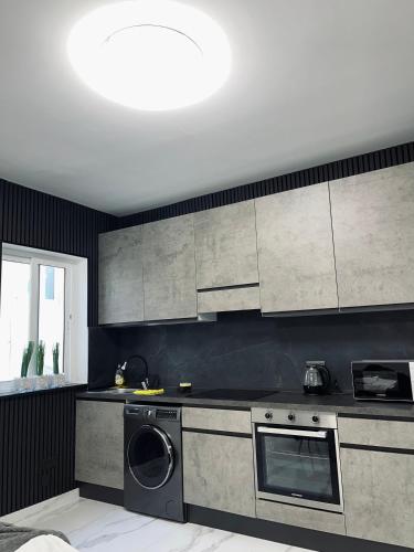 Una cocina o zona de cocina en MAPAS - luxury 3 bedroom Apartments