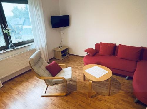 TV a/nebo společenská místnost v ubytování Zum Seeweiher