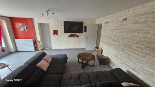 Posezení v ubytování Maison Petit Coin de Paradis