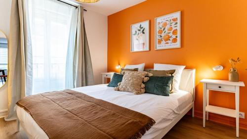 Llit o llits en una habitació de L'Orangeraie