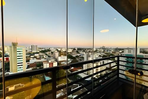 a view of the city from the balcony of a building at Loft Skyline - Vista de tirar o fôlego para cidade! in Uberlândia