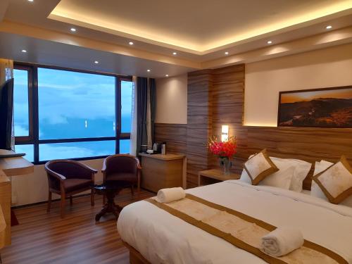 Katil atau katil-katil dalam bilik di Hotel Golden Potala