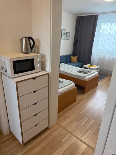 Postel nebo postele na pokoji v ubytování Adam apartmán