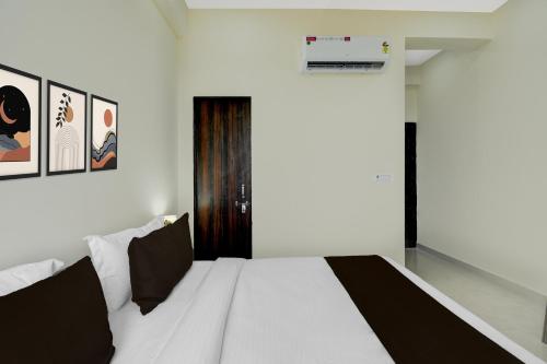 Cama o camas de una habitación en Hotel O Aabha Residency