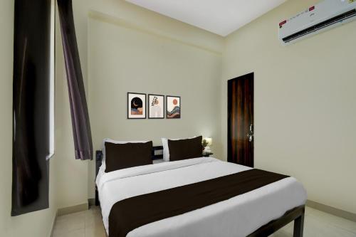 Cama o camas de una habitación en Hotel O Aabha Residency