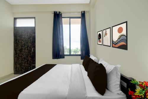 Cama o camas de una habitación en Hotel O Aabha Residency