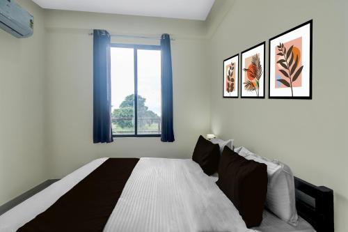 Cama o camas de una habitación en Hotel O Aabha Residency