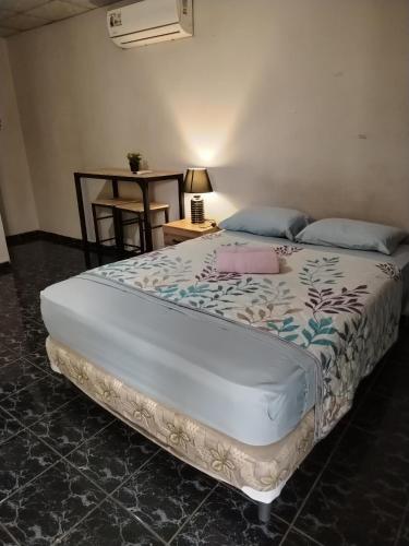 Un ou plusieurs lits dans un hébergement de l'établissement Apartahotel los cactus