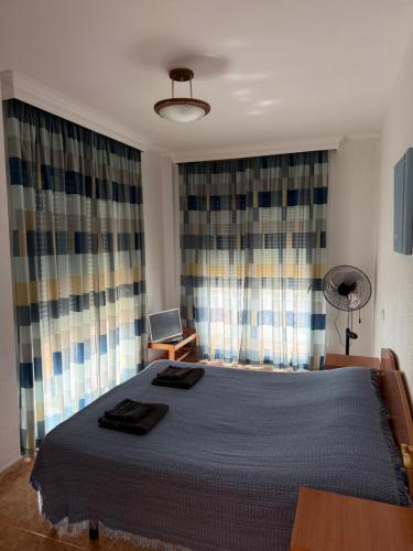 En eller flere senge i et værelse på Apartment San Pedro del Pinatar