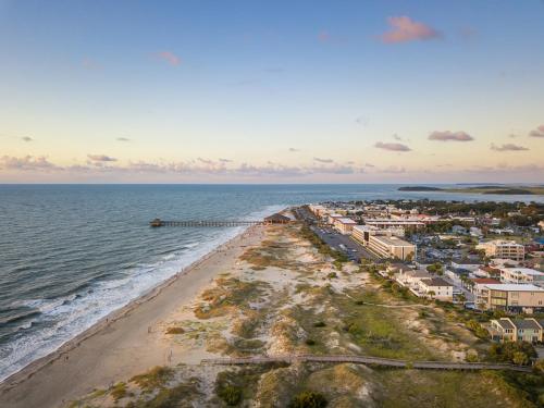 an aerial view of the shoreline of a beach at Brass Rail 106 in Tybee Island