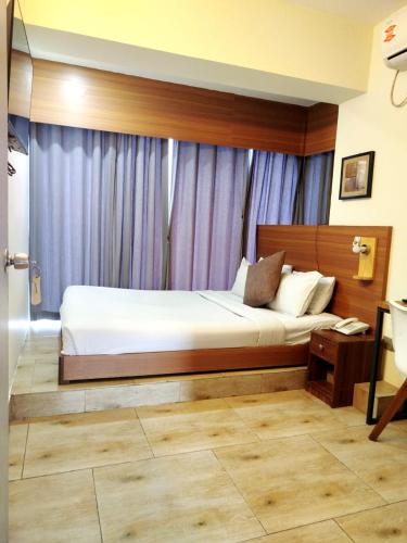 Кровать или кровати в номере Grand Imperial Hotel