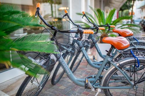 a couple of bikes parked next to each other at Hotel Centrale in Lignano Sabbiadoro