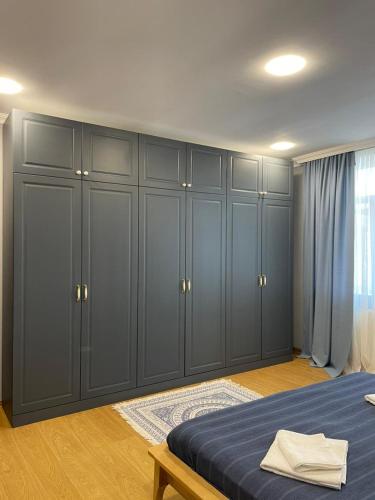 Una cama o camas en una habitación de ,,Demes's House'' - დემეს სახლი