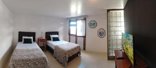 Кровать или кровати в номере Dolce Lobo Boutique Stay