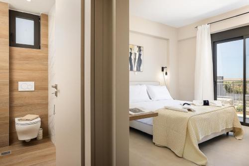 Ένα ή περισσότερα κρεβάτια σε δωμάτιο στο Emmanouil Private Villa A