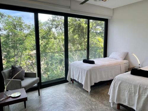 Postel nebo postele na pokoji v ubytování Exclusive 3 bdr Pent House Aldea Zama