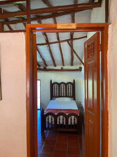 Postel nebo postele na pokoji v ubytování Hotel Casa Posada Don Chepe