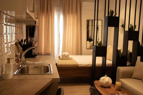 Ένα ή περισσότερα κρεβάτια σε δωμάτιο στο Vivere Suite 01 - Cozy Studio by Metro terminus