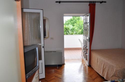 Kuchyň nebo kuchyňský kout v ubytování TRI SRCA apartments & rooms