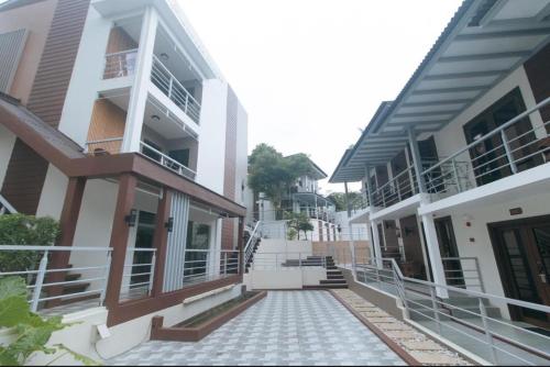 a walkway between two buildings in a city at Grospe Resort Boracay in Boracay