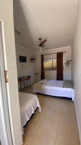 Katil atau katil-katil dalam bilik di Hotel Itiquira