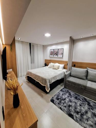 Ένα ή περισσότερα κρεβάτια σε δωμάτιο στο Vivencie Studio luxuoso no centro próximo ao Metrô Carioca