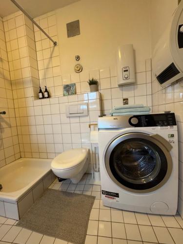 Boho Apartment in der Stadtmitteにあるバスルーム