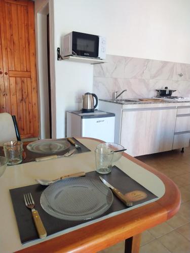 Η κουζίνα ή μικρή κουζίνα στο Apart Cabañas La Estancia