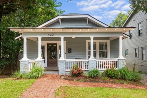 a house with a front porch with at Best in Show in Atlanta