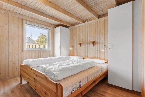 Una cama o camas en una habitación de 3673-Nexo-Frederiksvej-54