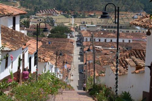 a view of a town with roofs and buildings at Casa Nueva en Zapatoca in Zapatoca