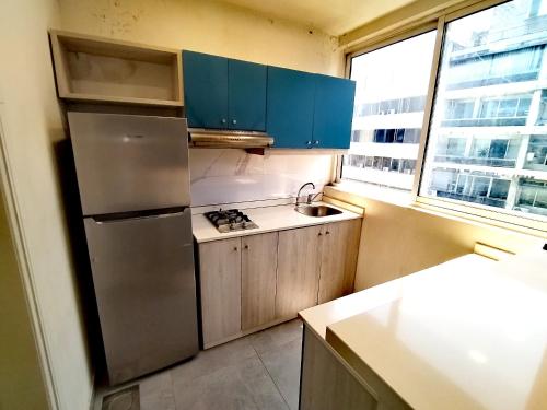 Kuchyň nebo kuchyňský kout v ubytování White House Suites
