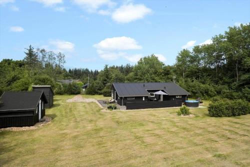 a large yard with a house in the background at HA173-Asaa-Knirren-6-B in Aså