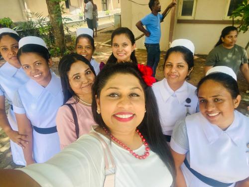 a group of women posing for a picture at Zensigiri Ayurveda Wellness Homestay in Sigiriya